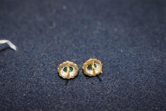 A pair of 14ct gold, emerald and diamond earrings and a pair of 18ct gold, ruby and diamond earrings
